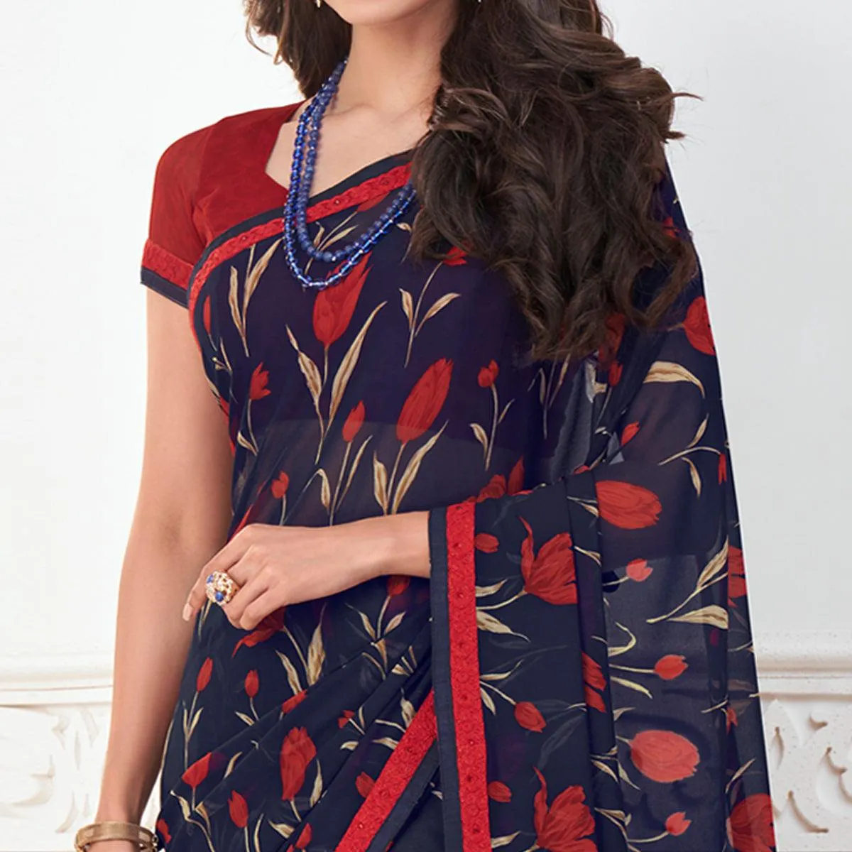 Adorable Navy Blue Colored Casual Wear Floral Printed Pure Georgette Saree